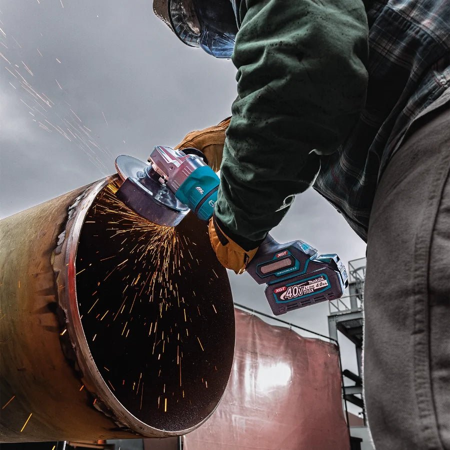 Makita GAG14M1 40V max XGT® Brushless Cordless 4‑1/2” / 6" Paddle Switch Angle Grinder Kit, with Electric Brake (4.0Ah) - Lined Out Makita GAG14M1 40V max XGT® Brushless Cordless 4‑1/2” / 6" Paddle Switch Angle Grinder Kit, with Electric Brake (4.0Ah)Grinders