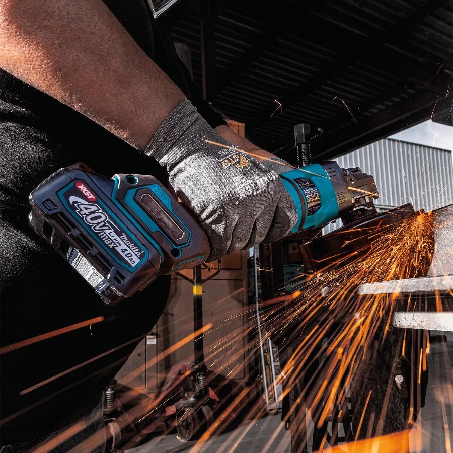 Makita GAG14M1 40V max XGT® Brushless Cordless 4‑1/2” / 6" Paddle Switch Angle Grinder Kit, with Electric Brake (4.0Ah) - Lined Out Makita GAG14M1 40V max XGT® Brushless Cordless 4‑1/2” / 6" Paddle Switch Angle Grinder Kit, with Electric Brake (4.0Ah)Grinders
